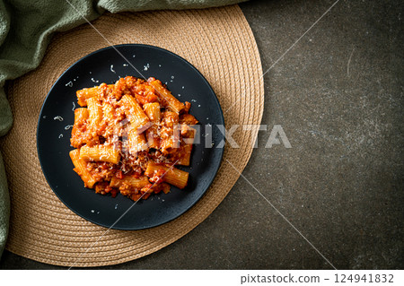 Rigatoni pasta bolognese with cheese 124941832