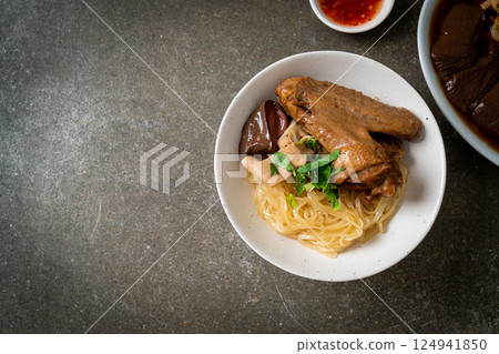 dried noodles with braised duck in white bowl dried noodles with braised duck in white bowl 124941850