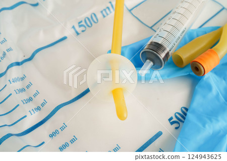 Foley catheter and urine drainage bag collect urine for disability or patient in hospital. 124943625