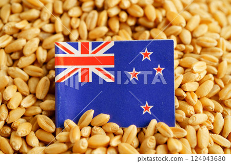 New Zealand flag on grain wheat, trade export and economy concept. New Zealand flag on grain wheat, trade export and economy concept. 124943680