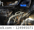 burnt house and car, viewed inside 124945071