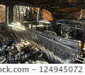 burnt house and car, viewed inside 124945072
