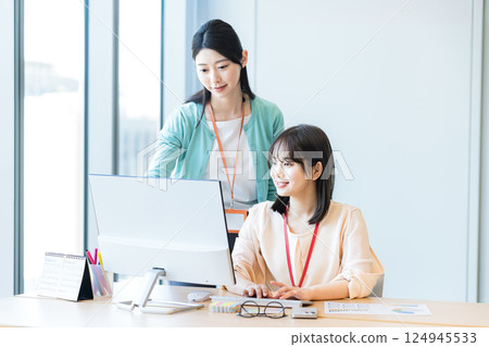 Business woman working in the office Business woman working in the office 124945533
