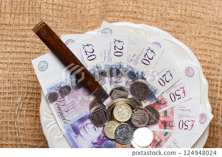 British money on kitchen table, coast of living 124948024