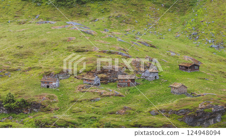 Norwegian old country houses in mountains. Norwegian old country houses in mountains. 124948094