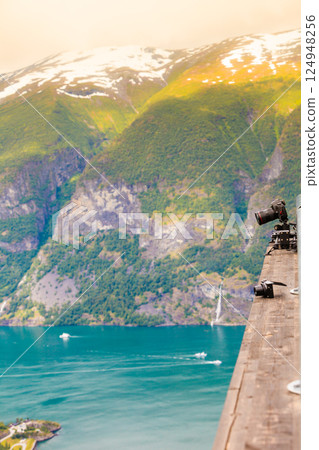 Camera in mountains, photography in wildlife Camera in mountains, photography in wildlife 124948256