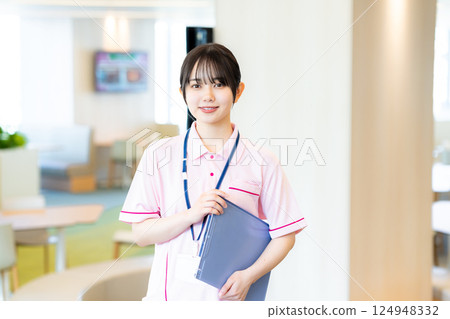 Medical personnel with files 124948332
