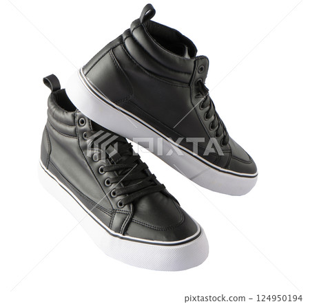 Shoes isolated white background. A pair of black leather shoes. New fashionable sneakers. Sports style. Unisex boots. 124950194