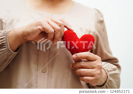 Asian woman holding human internal organ model, donation charity volunteer concept. Asian woman holding human internal organ model, donation charity volunteer concept. 124952171