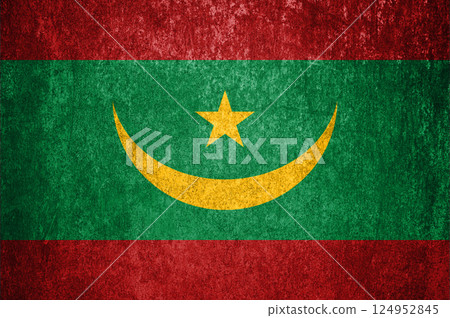 Mauritania State Flag. Dirty Mauritania flag on metal surface. 124952845