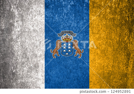 Canary Islands Flag. Dirty Canary Islands flag on metal surface. Canary Islands Flag. Dirty Canary Islands flag on metal surface. 124952891