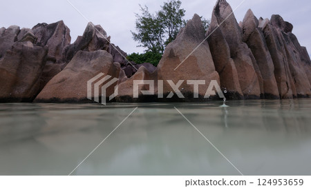 low angle shot of rocks on Curieuse island Seychelles low angle shot of rocks on Curieuse island Seychelles 124953659