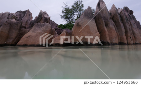 low angle shot of rocks on Curieuse island Seychelles low angle shot of rocks on Curieuse island Seychelles 124953660