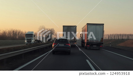 Highway driving truck overtake slowly for a long time Highway driving truck overtake slowly for a long time 124953918
