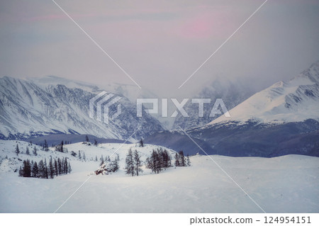 Twilight mountains covered with snow. Twilight mountains covered with snow. 124954151
