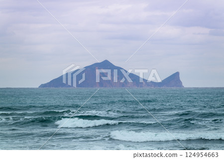 Layered Waves: Turtle Island Beckons from Yilan Shore. 124954663