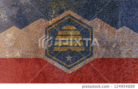 Utah State Flag. Dirty Utah state flag on rusty metal surface. 124954889