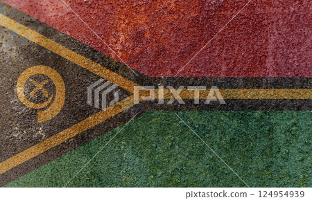 Vanuatu State Flag. Dirty Vanuatu flag on metal surface. 124954939
