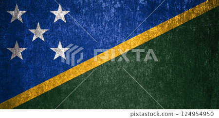 Solomon Islands Flag. Dirty Solomon Islands flag on metal surface. 124954950