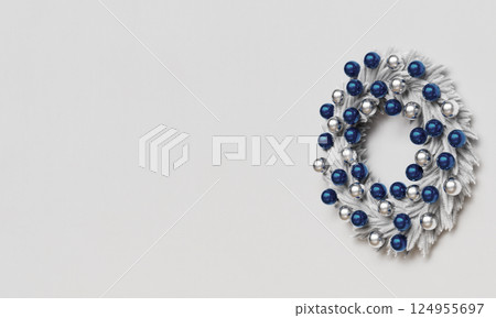 Christmas White Wreath Decoration on Wall. 3D Rendering 124955697