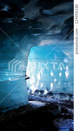 A stream in a blue ice cave 124956186