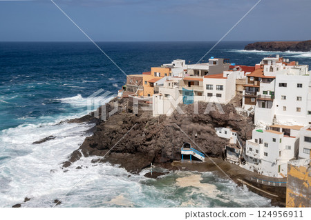 Village on a rock and Atlantic ocean, Spain Village on a rock and Atlantic ocean, Spain 124956911