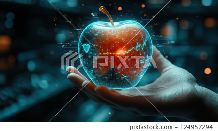 Glowing digital apple with futuristic holographic effects is held in hand, symbolizing health and technology 124957294