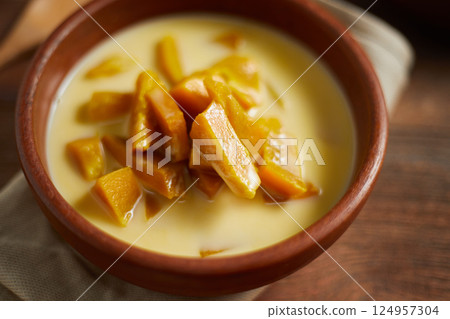 Poached Pumpkin in Coconut Milk 124957304