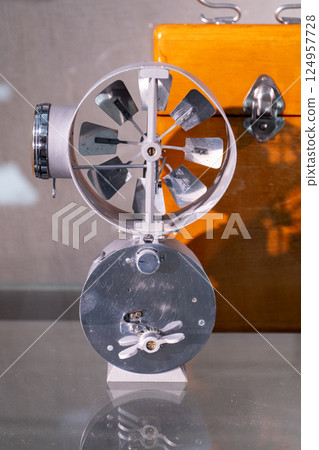 Anemometer is a device for measuring the speed of movement of air gases. In meteorology, for measuring wind speed. Small propeller blades. Anemometer is a device for measuring the speed of movement of air gases. In meteorology, for measuring wind speed. Small propeller blades. 124957728