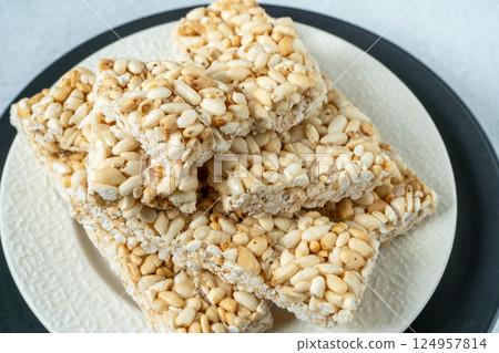 Sweet puffed rice. Food dessert crispy cracker with sugar 124957814