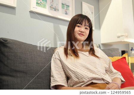 Girl in the Living Room Girl in the Living Room 124959565