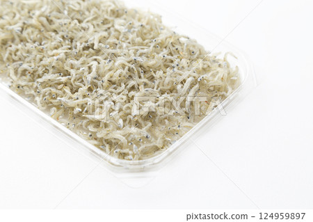 Chirimen anchovies on white background Chirimen anchovies on white background 124959897