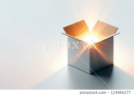 An open box with a shining light. Space for text. An open box with a shining light. Space for text. 124960277