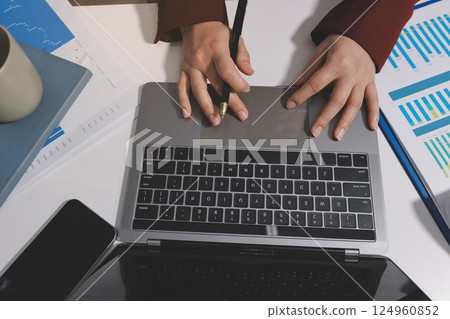 Tax deduction planning concept. Women use a calculator to calculate expenses and taxes to receive tax deductions for personal individual Income. tax return for individual persons.monthly expenses 124960852