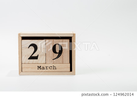 Wooden calendar March 29 on a white background Wooden calendar March 29 on a white background 124962014
