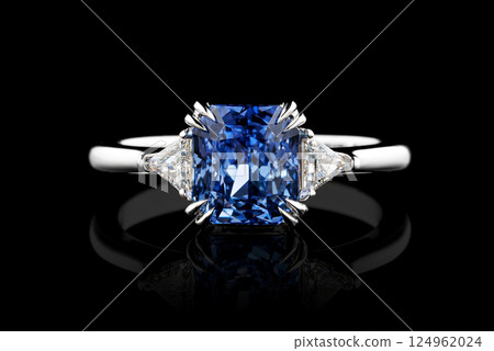 white metal ring, silver, gold with sapphire stone, diamonds on black background white metal ring, silver, gold with sapphire stone, diamonds on black background 124962024