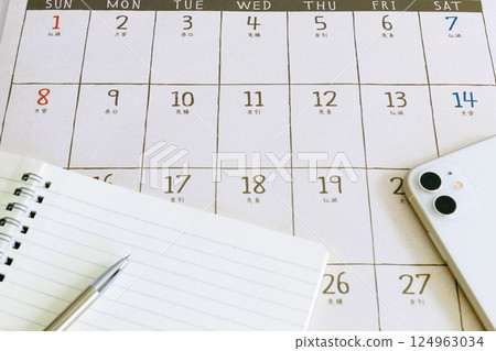 Pen, notebook and calendar - Schedule management 124963034