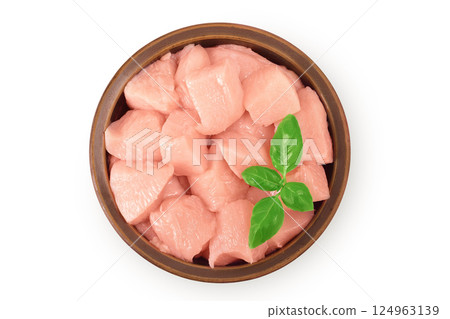 Raw diced chicken fillet in ceramic bowl isolated on white background. Top view. Flat lay Raw diced chicken fillet in ceramic bowl isolated on white background. Top view. Flat lay 124963139
