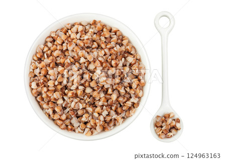 Boiled buckwheat in a ceramic bowl isolated on white background. Top view. Flat lay Boiled buckwheat in a ceramic bowl isolated on white background. Top view. Flat lay 124963163