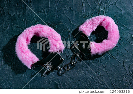 Pink fluffy handcuffs 124963216