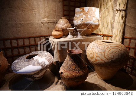 Real ancient pottery glued together from separate fragments 124963848