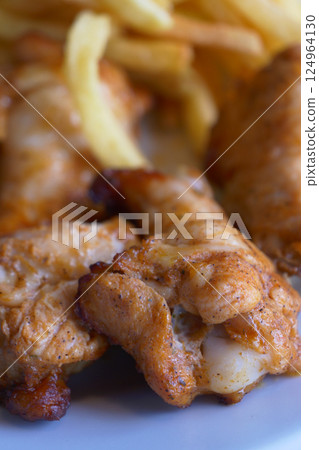 Typical dish of chicken wings on a plate Typical dish of chicken wings on a plate 124964130