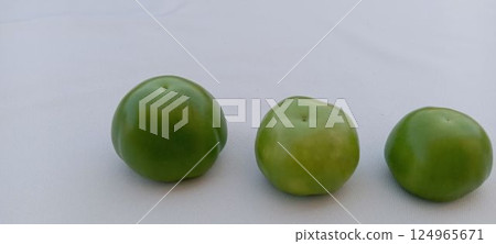 3 tomatillos (copy space, white background) 3 tomatillos (copy space, white background) 124965671