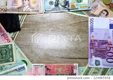 Banknotes of different countries dollars, euros, rubles on the table 124965938
