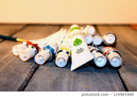 Tubes of acrylic paint lie on the table Tubes of acrylic paint lie on the table 124965986