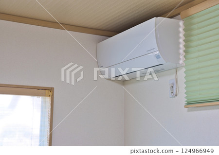 Air conditioner installed in the room 124966949