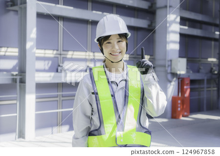Portrait of a young female worker on the roof of a building. Photo courtesy of Tokyo Electronics College, Denpa Gakuen Corporation. Portrait of a young female worker on the roof of a building. Photo courtesy of Tokyo Electronics College, Denpa Gakuen Corporation. 124967858