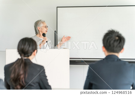 Senior businesswomen giving presentations at workshops, seminars, training sessions, and presentations (lectures, key points, strategies, education) Senior businesswomen giving presentations at workshops, seminars, training sessions, and presentations (lectures, key points, strategies, education) 124968516