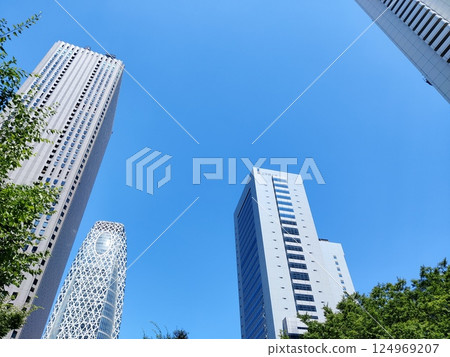 Landscape of the office town looking up at a skyscraper Landscape of the office town looking up at a skyscraper 124969207