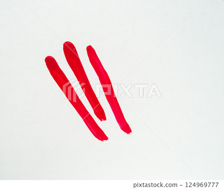 Smears of red nail polish on a white background, beauty concept 124969777